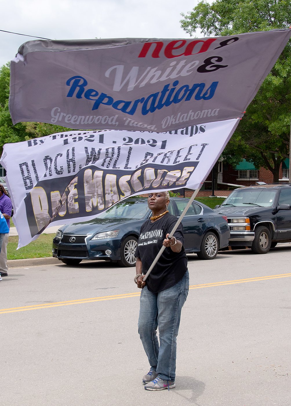 Participants in the 100th anniversary Tulsa Race Massacre street parade